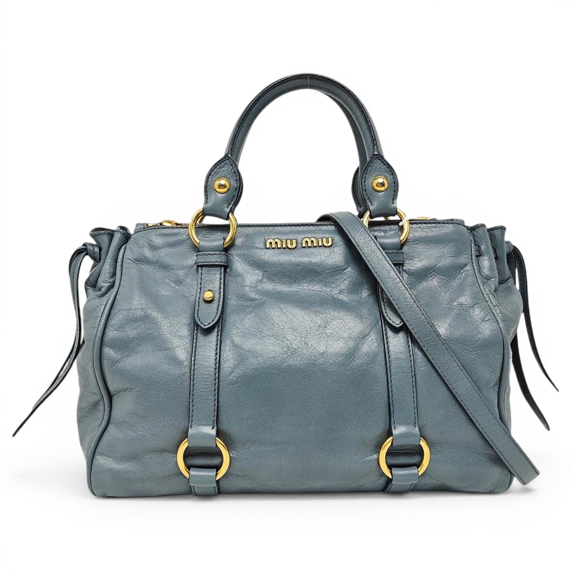 Bow bag leather handbag