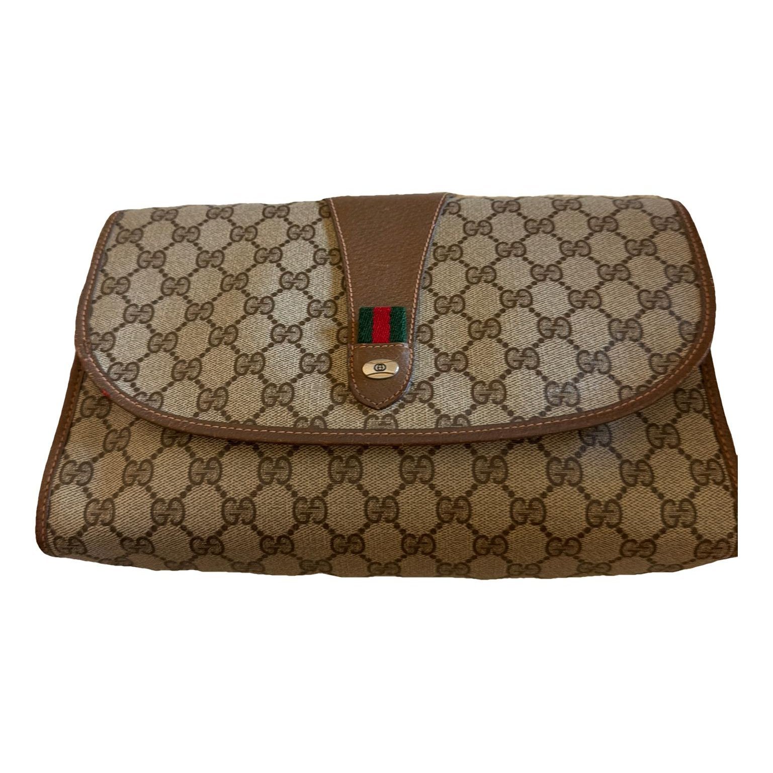 Ophidia leather clutch bag