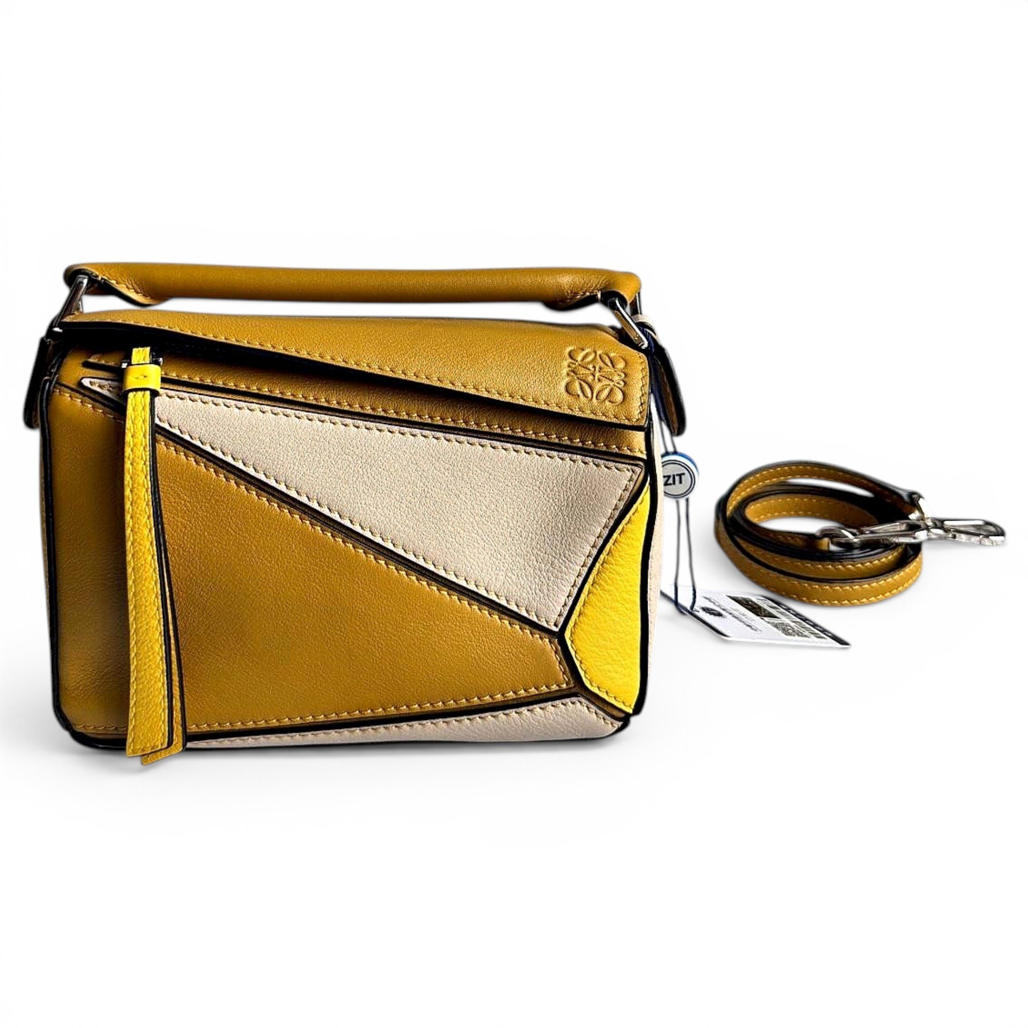 Puzzle leather crossbody bag