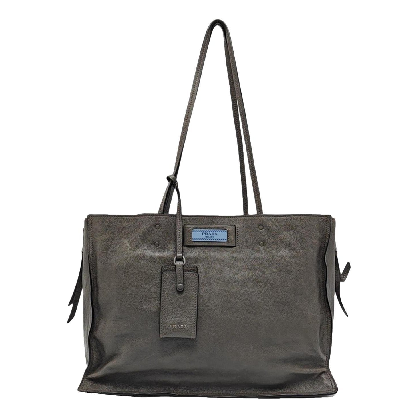 Etiquette leather handbag