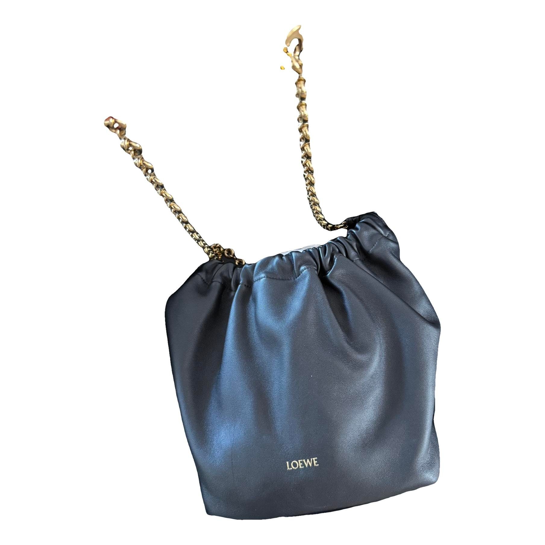 Squeeze leather crossbody bag