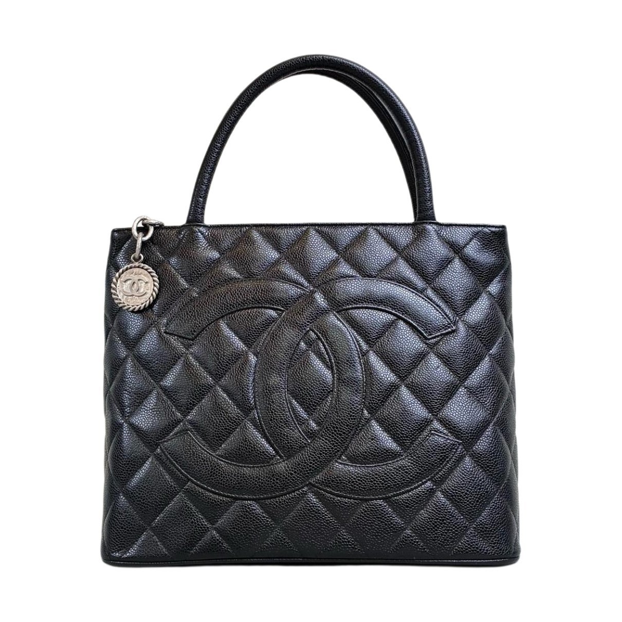 Médaillon leather handbag