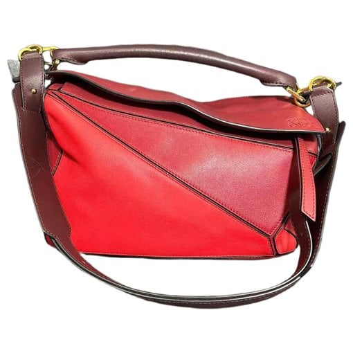 Puzzle leather handbag