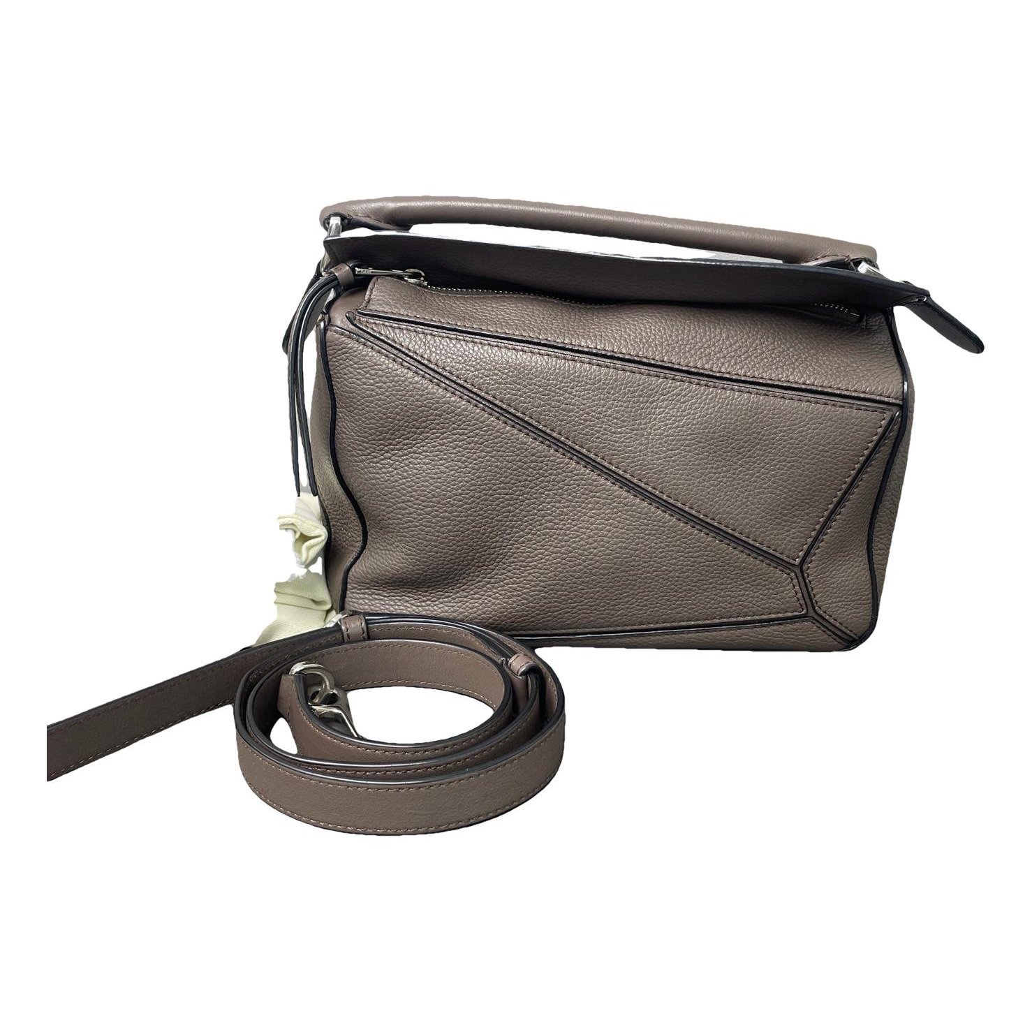 Puzzle leather crossbody bag