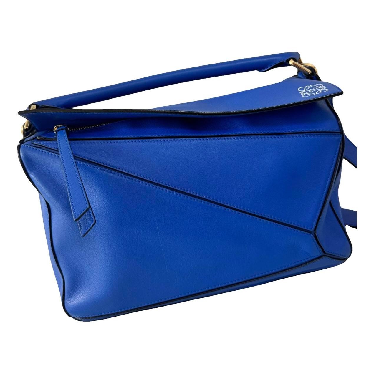 Puzzle leather handbag