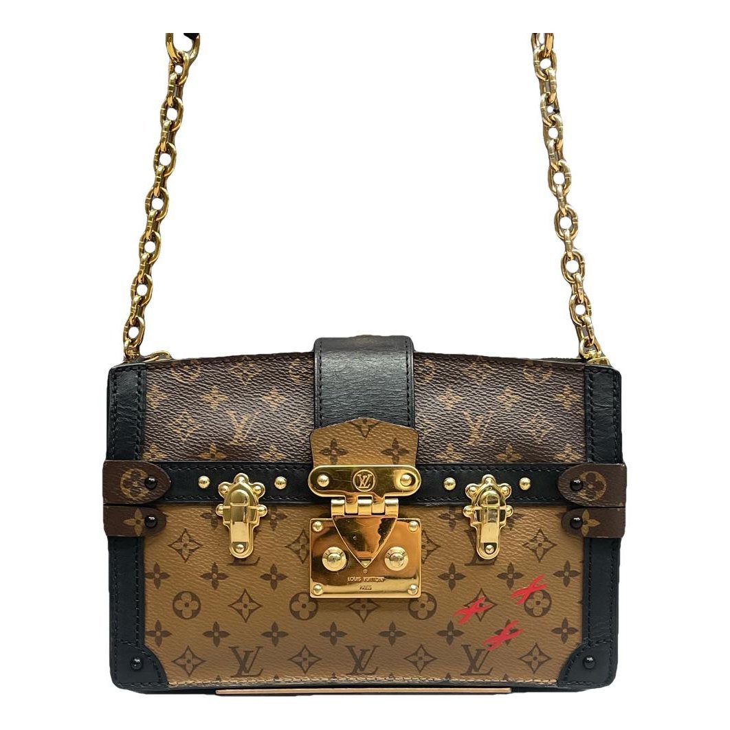 Pochette Trunk leather handbag