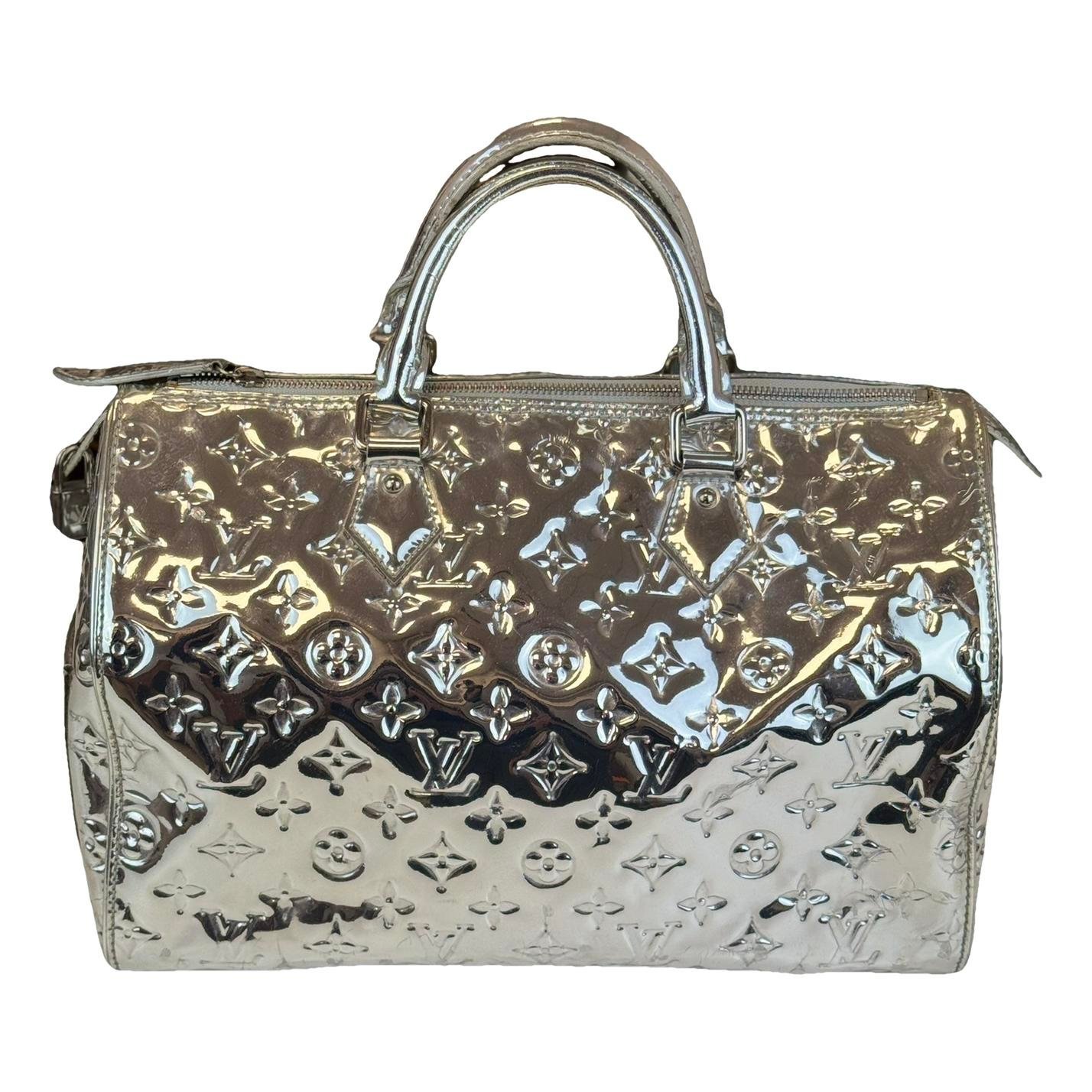Speedy patent leather handbag