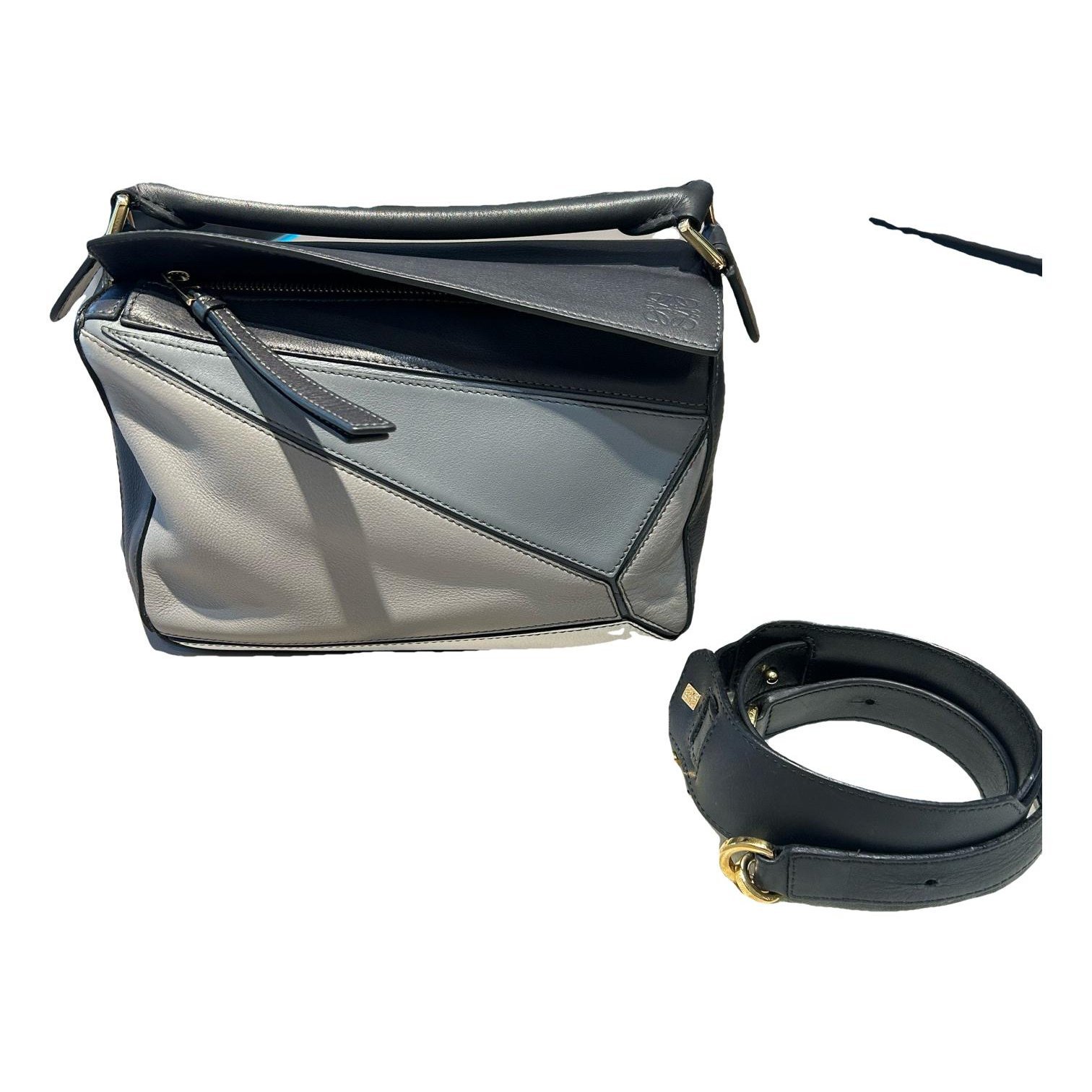 Puzzle leather handbag