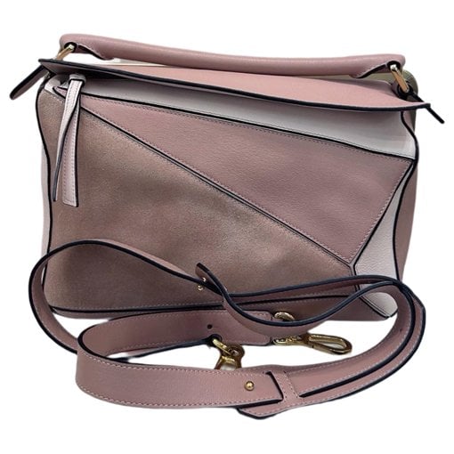Puzzle leather handbag