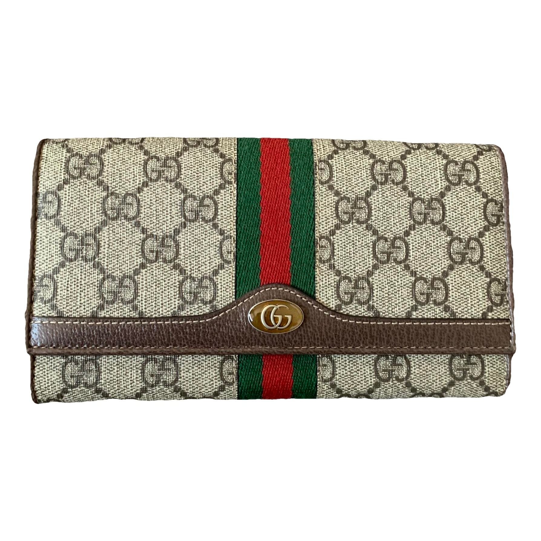 Ophidia cloth clutch bag