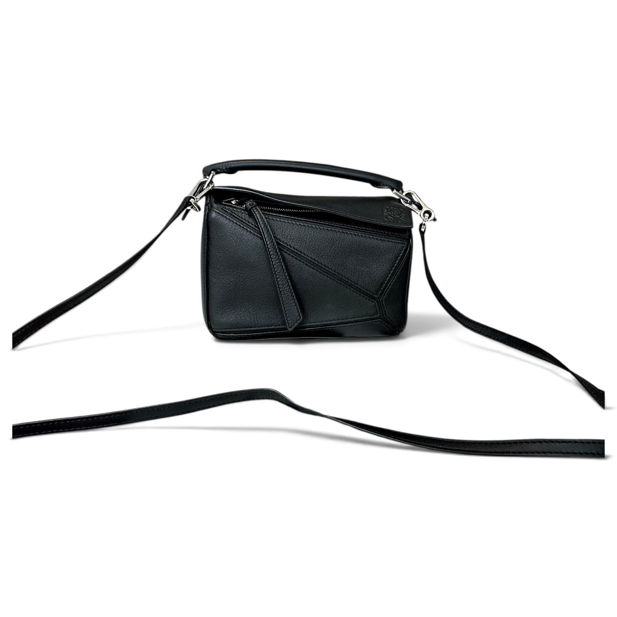 Puzzle leather handbag