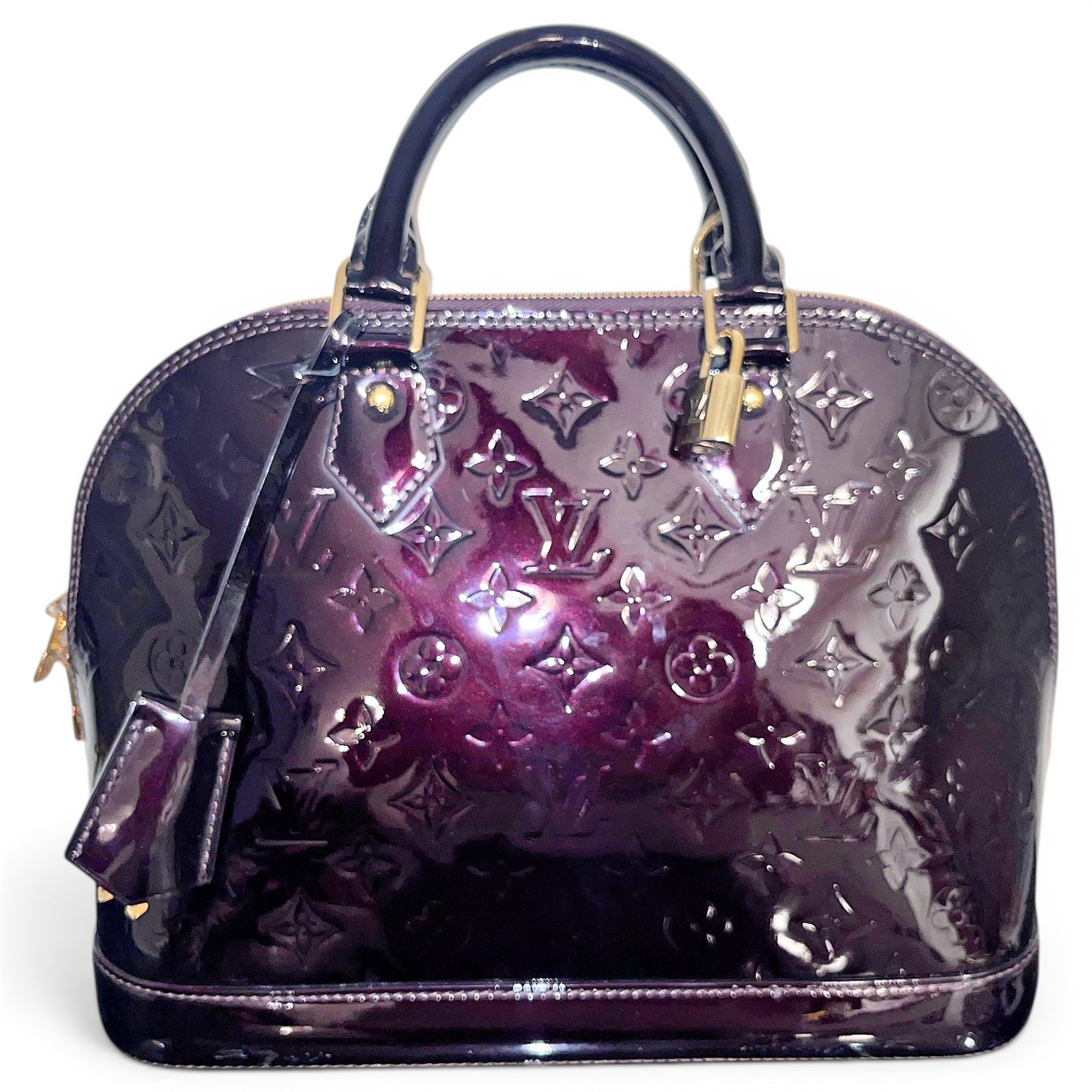 Louis Vuitton Alma patent leather handbag