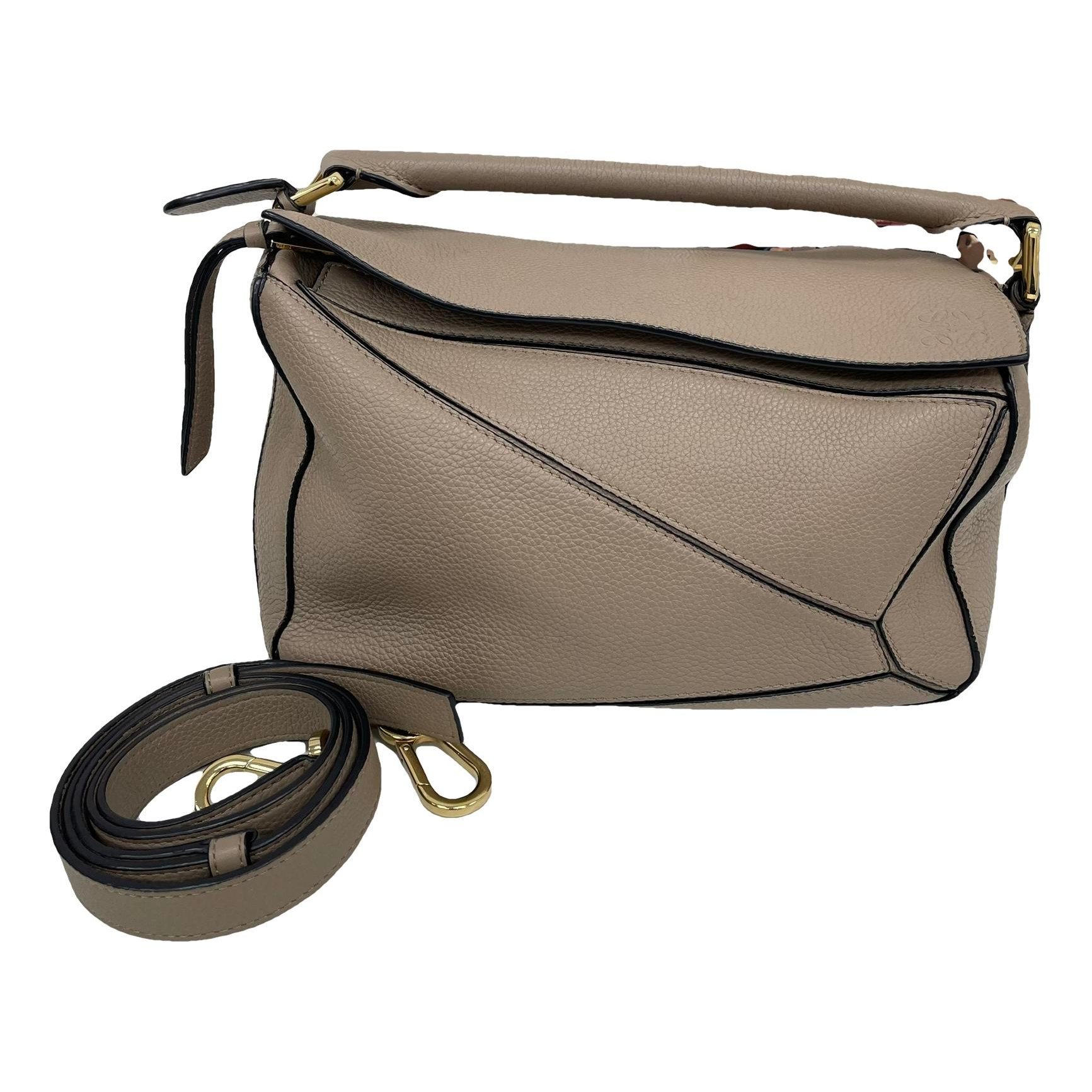 Puzzle leather handbag