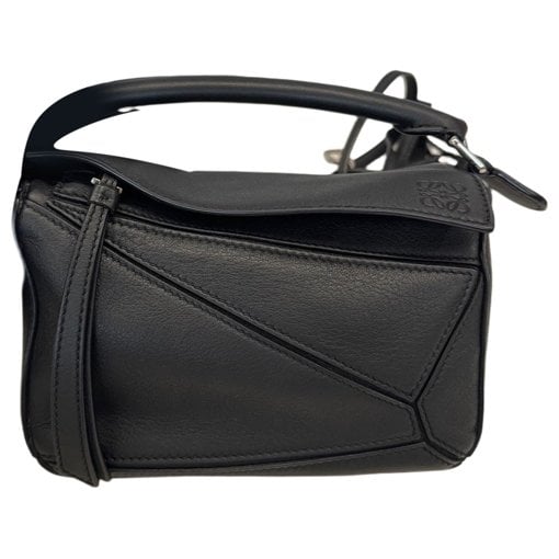 Puzzle leather handbag