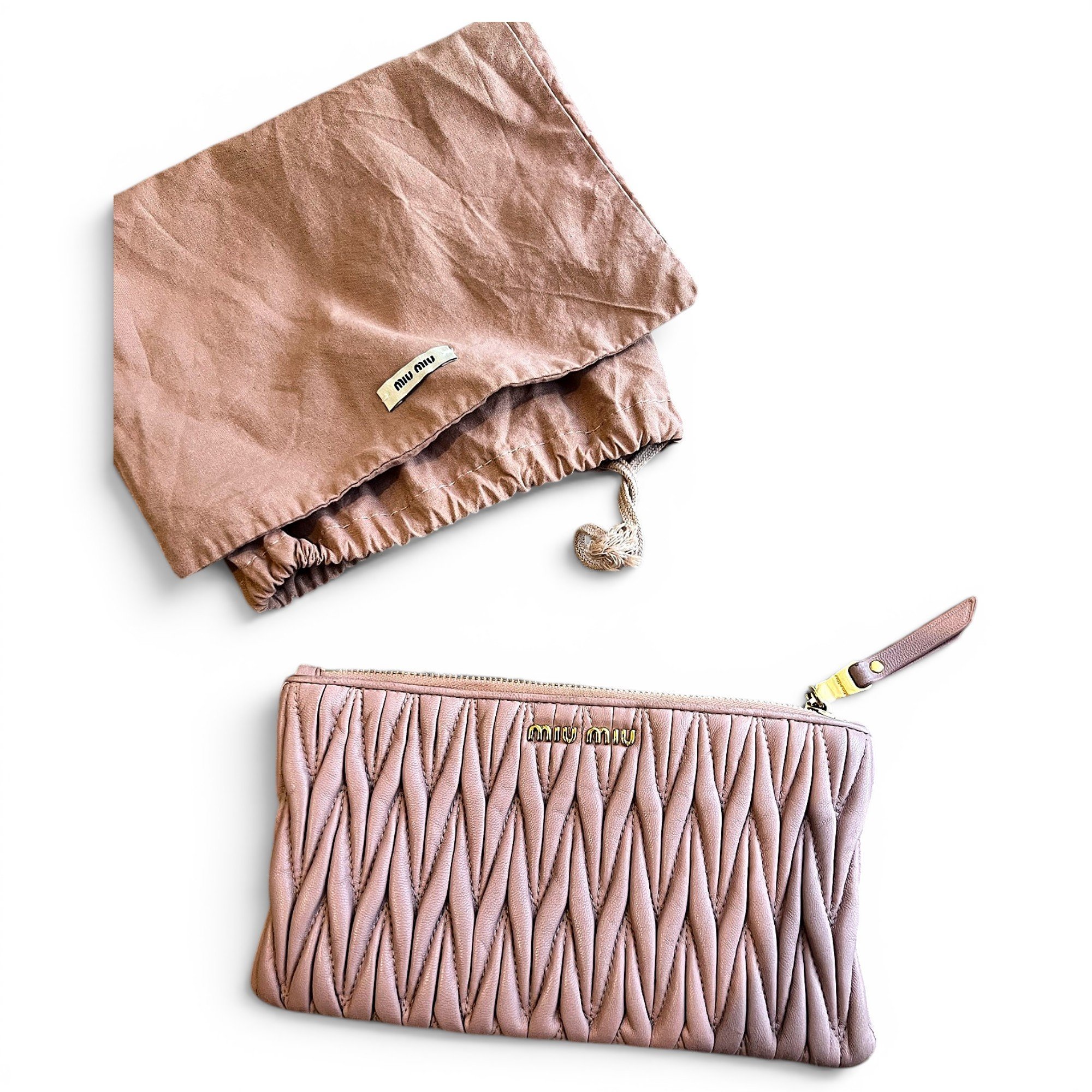 Matelassé leather clutch bag