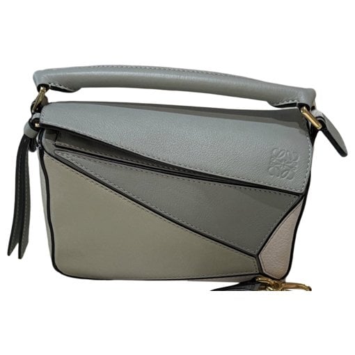 Puzzle leather handbag