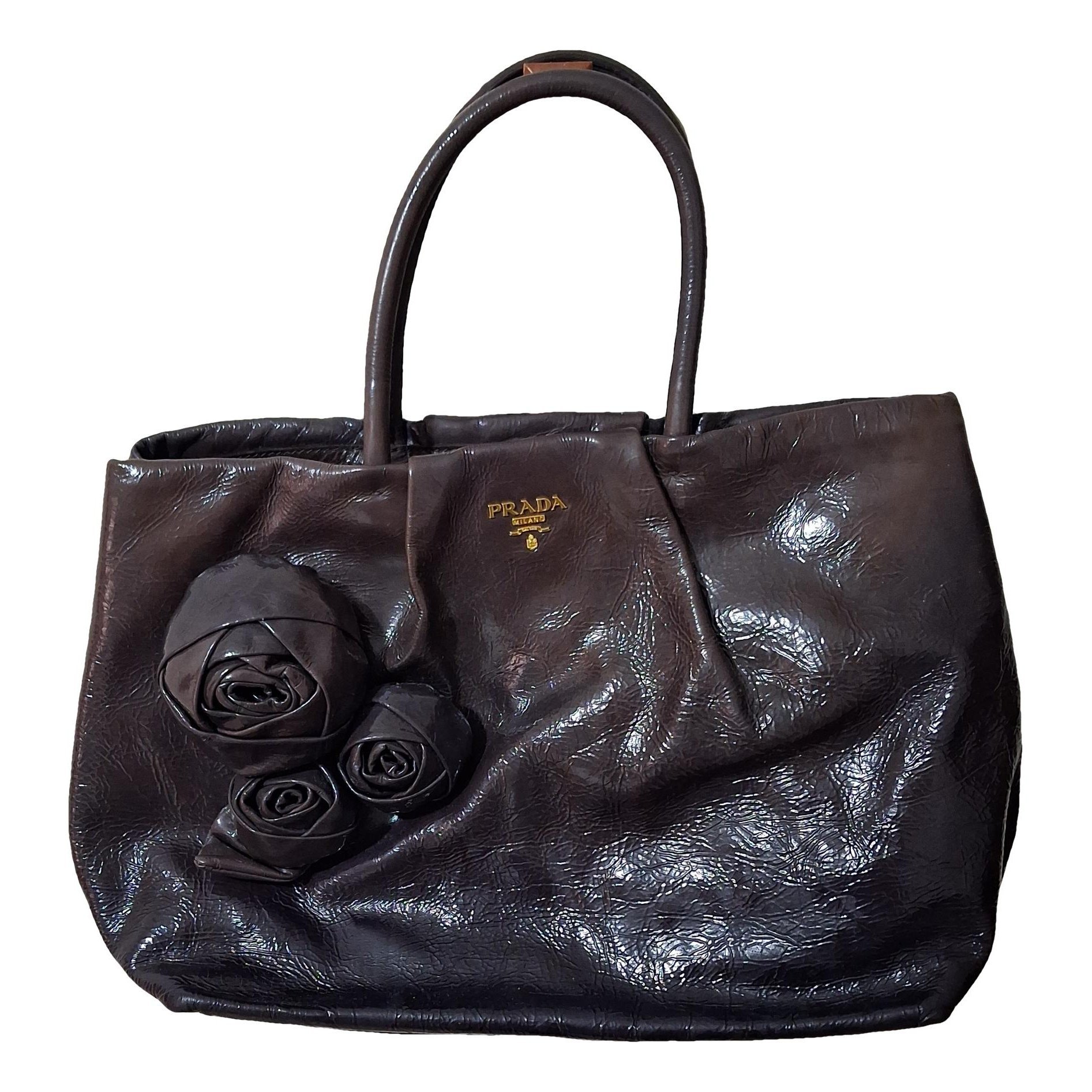 Pyramid patent leather handbag