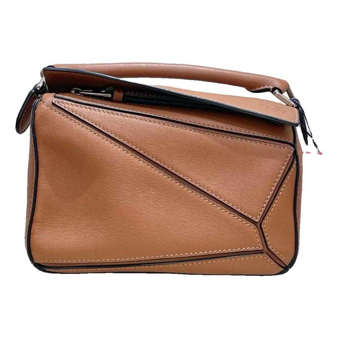 Puzzle leather handbag