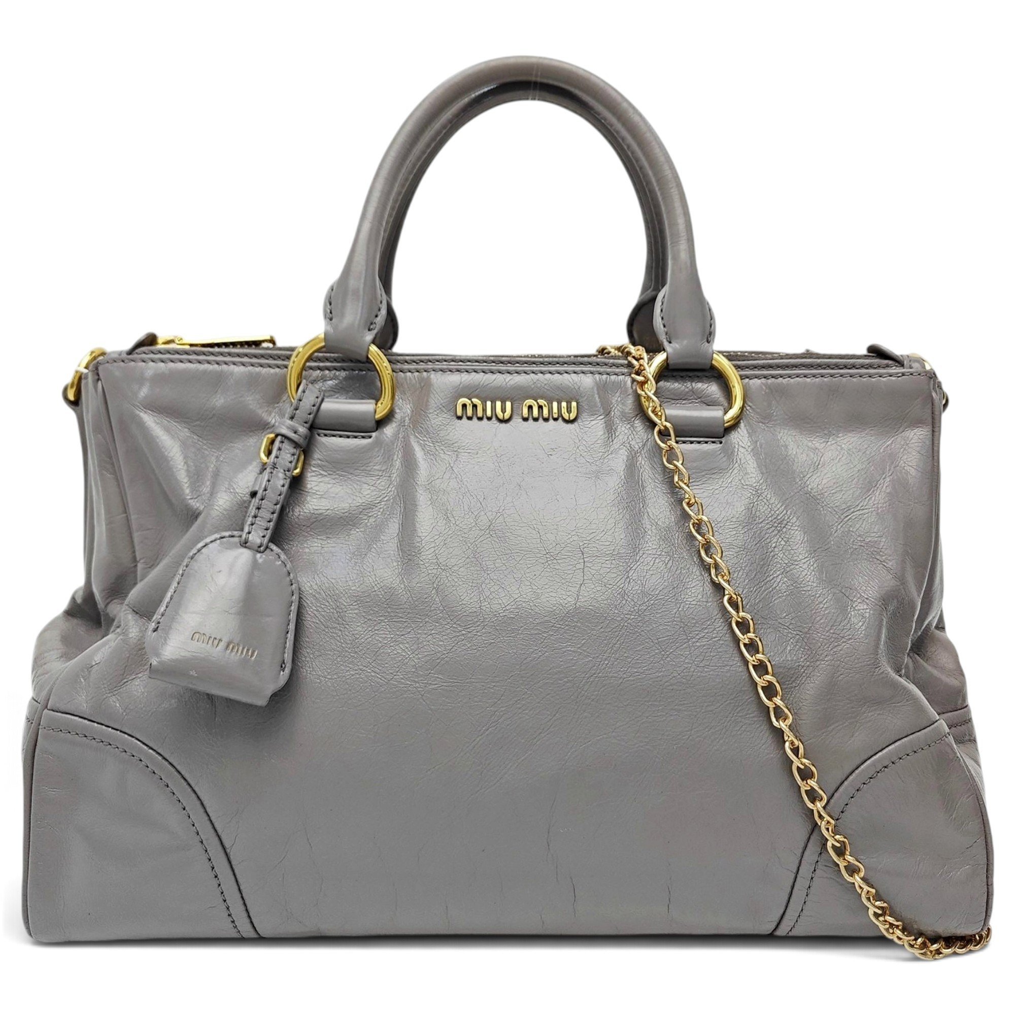 Bow bag leather handbag