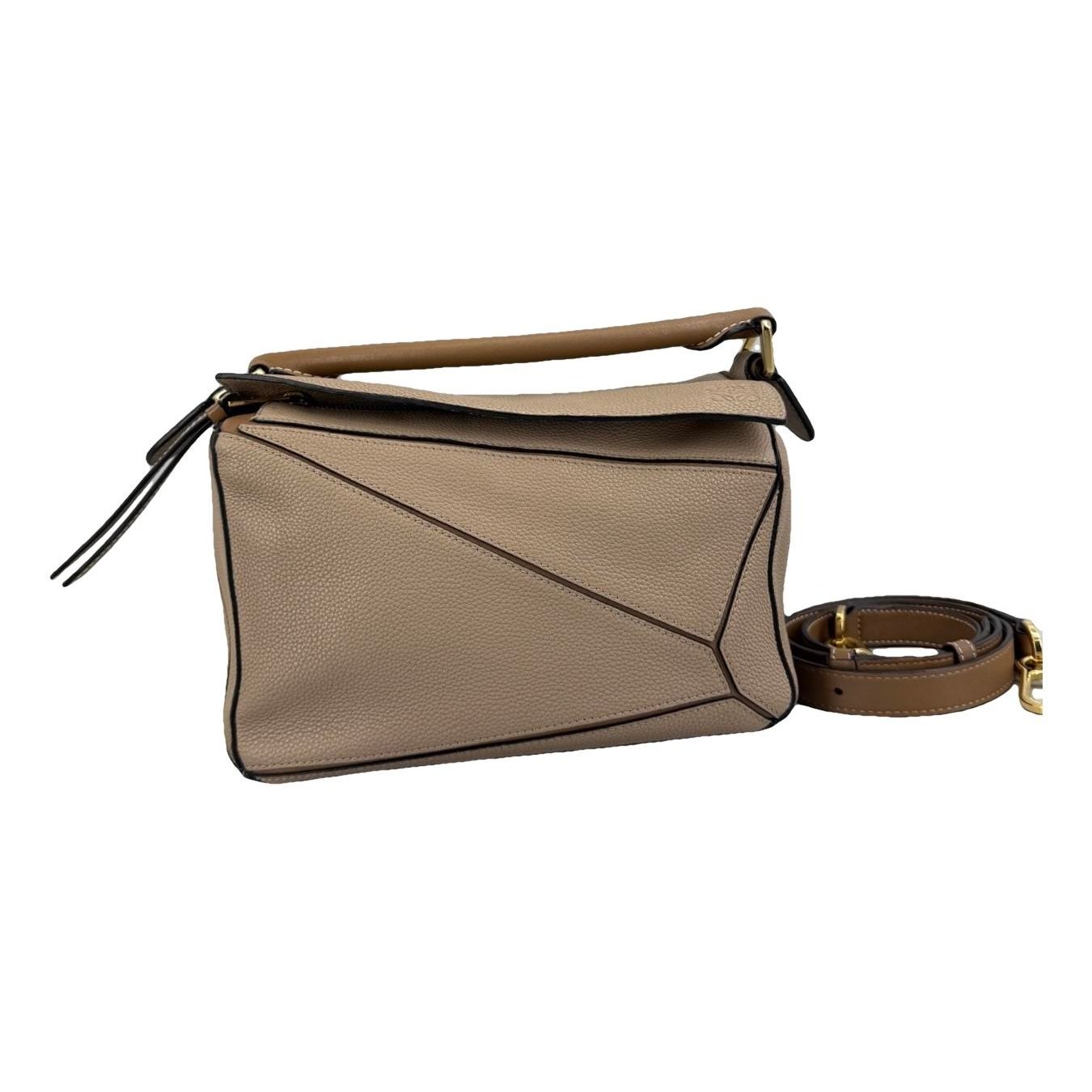 Puzzle leather handbag