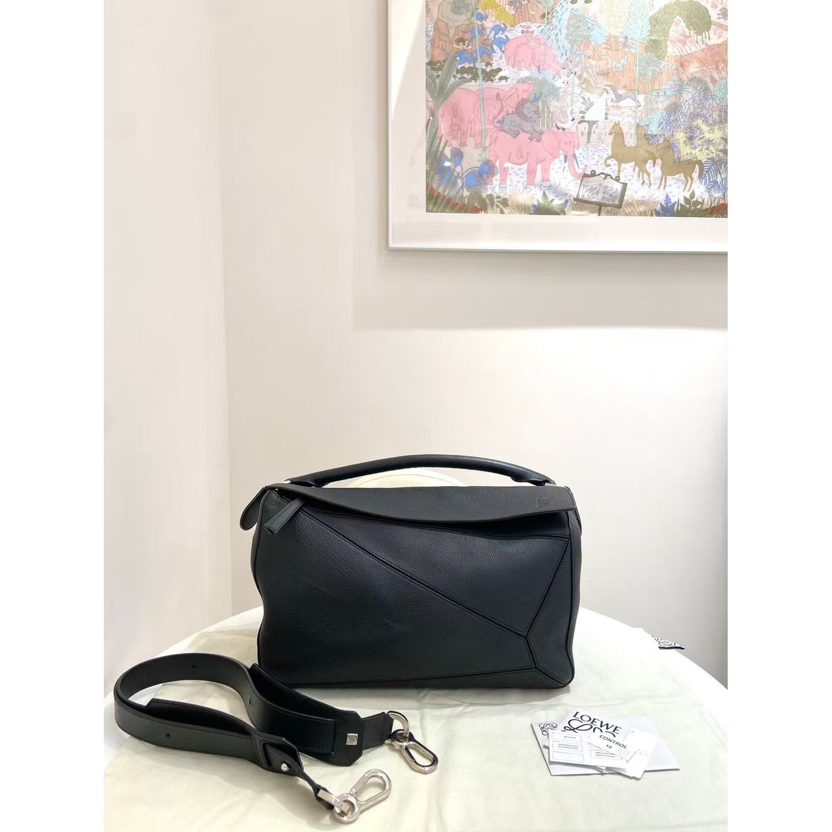 Puzzle leather handbag