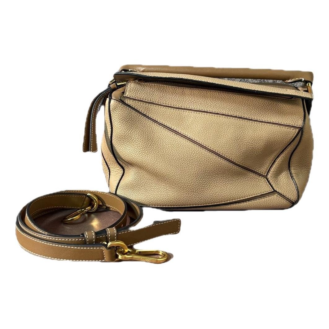 Puzzle leather handbag