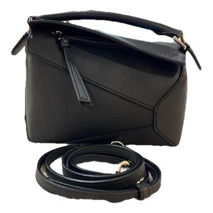 Puzzle leather handbag