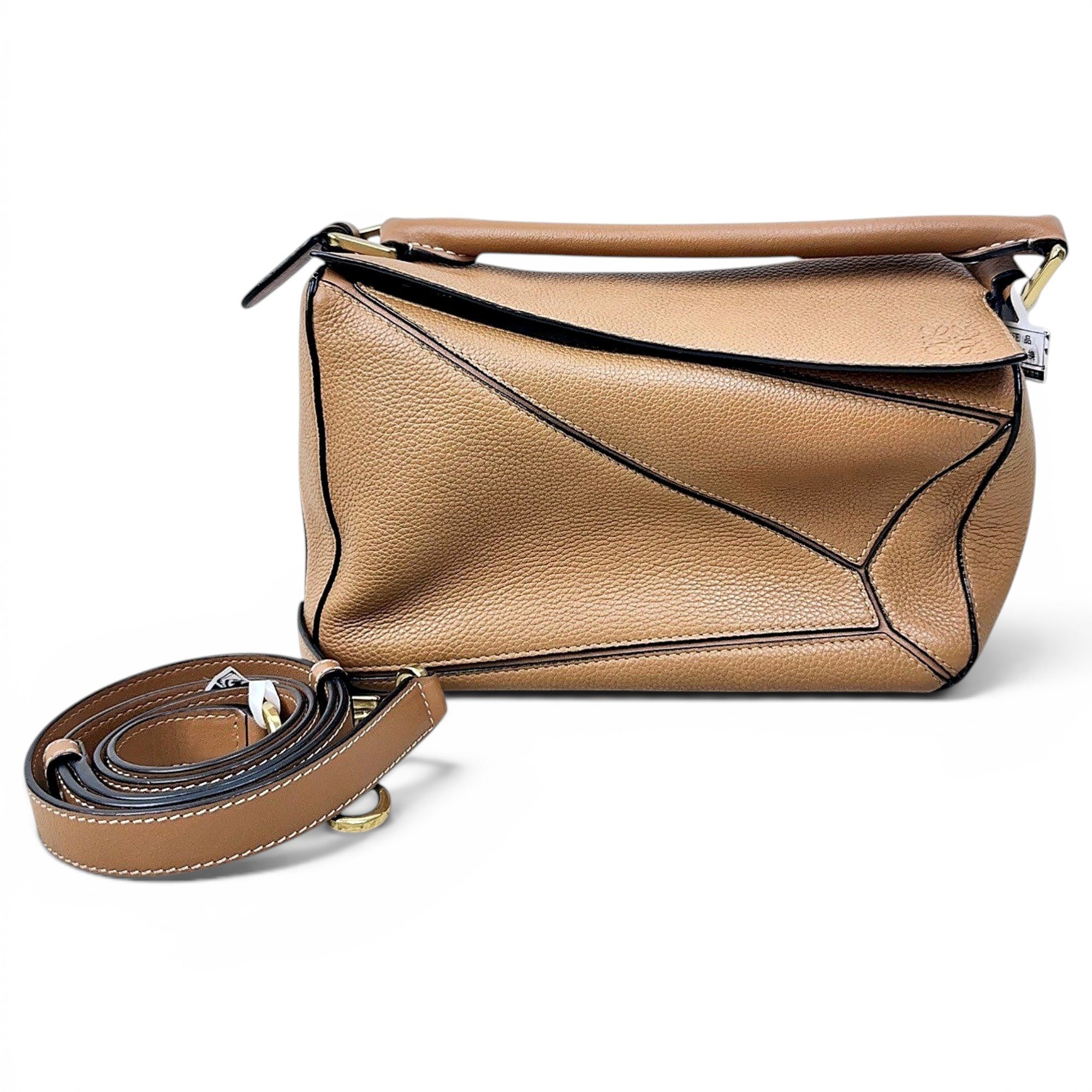 Puzzle leather handbag