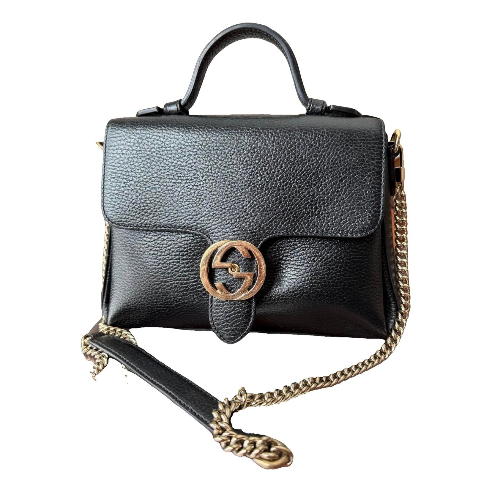 Interlocking leather handbag