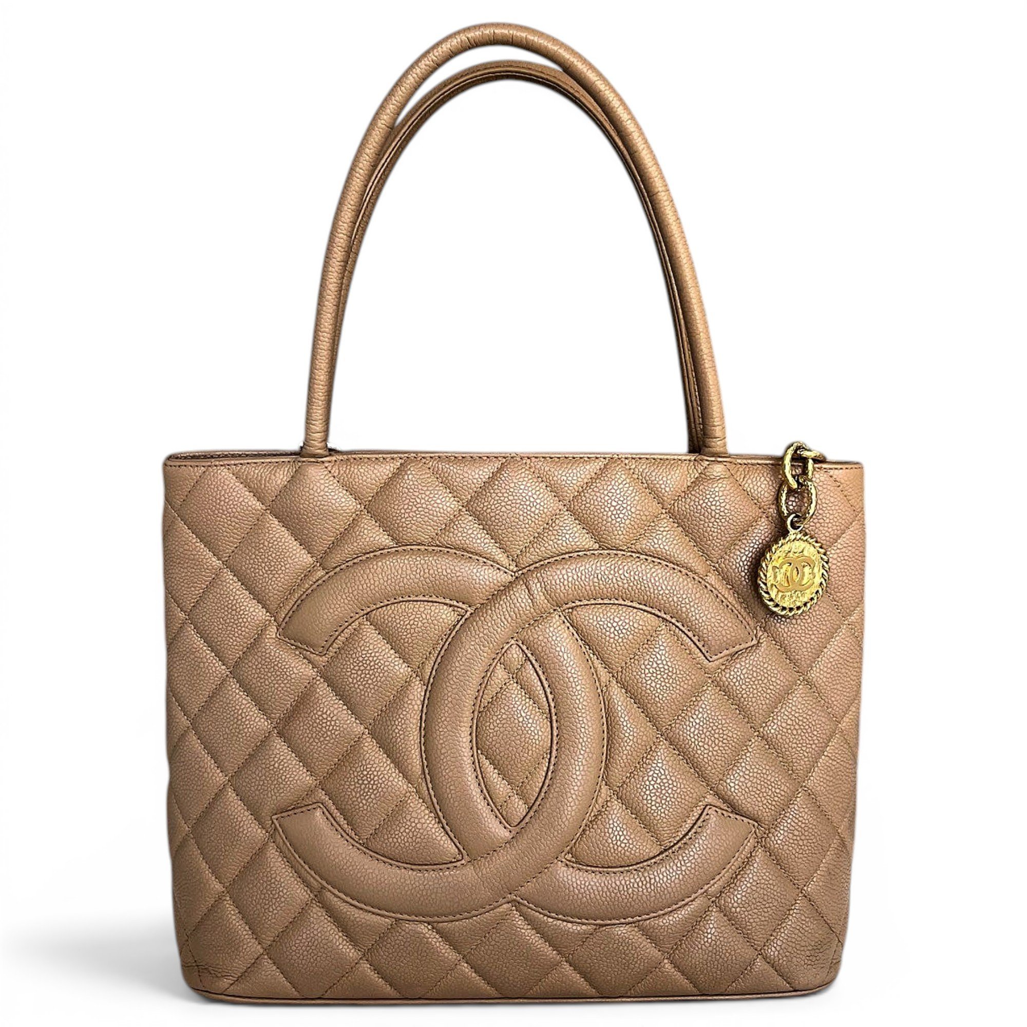 Médaillon leather handbag