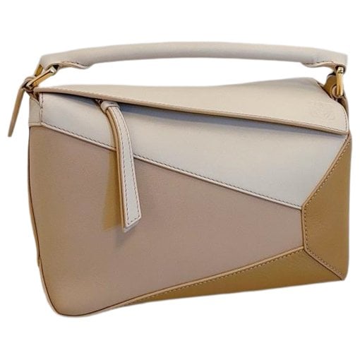 Puzzle leather handbag