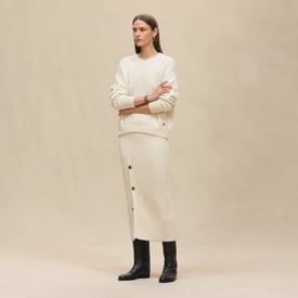 Buttoned mid-length skirt with slit