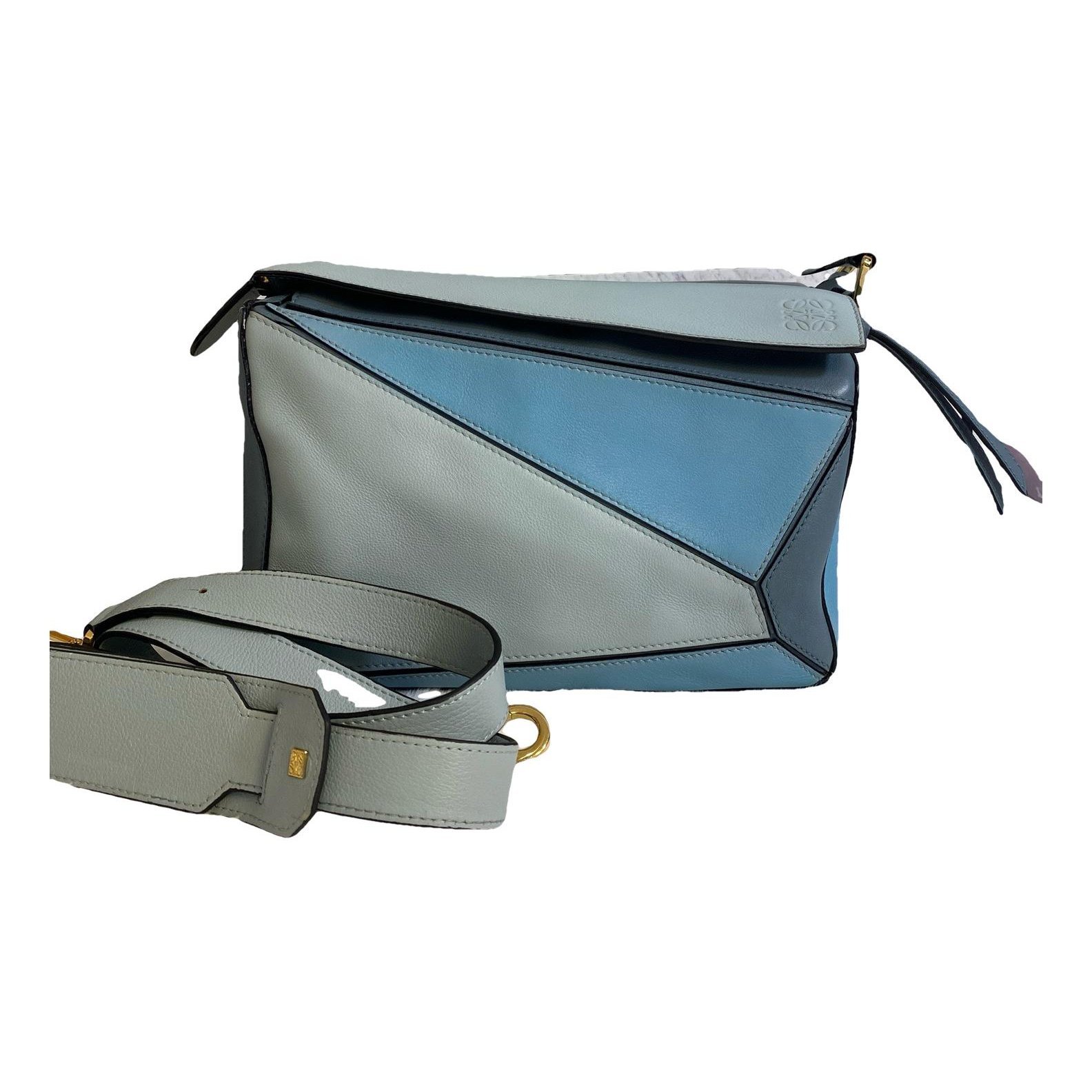 Puzzle leather handbag