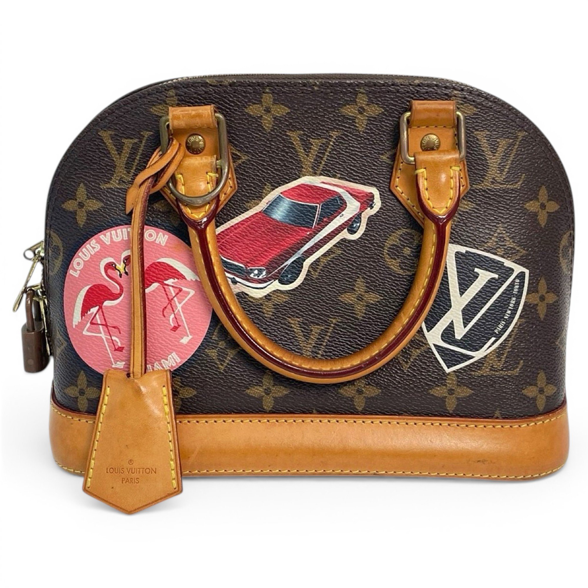 Louis Vuitton Alma BB cloth handbag
