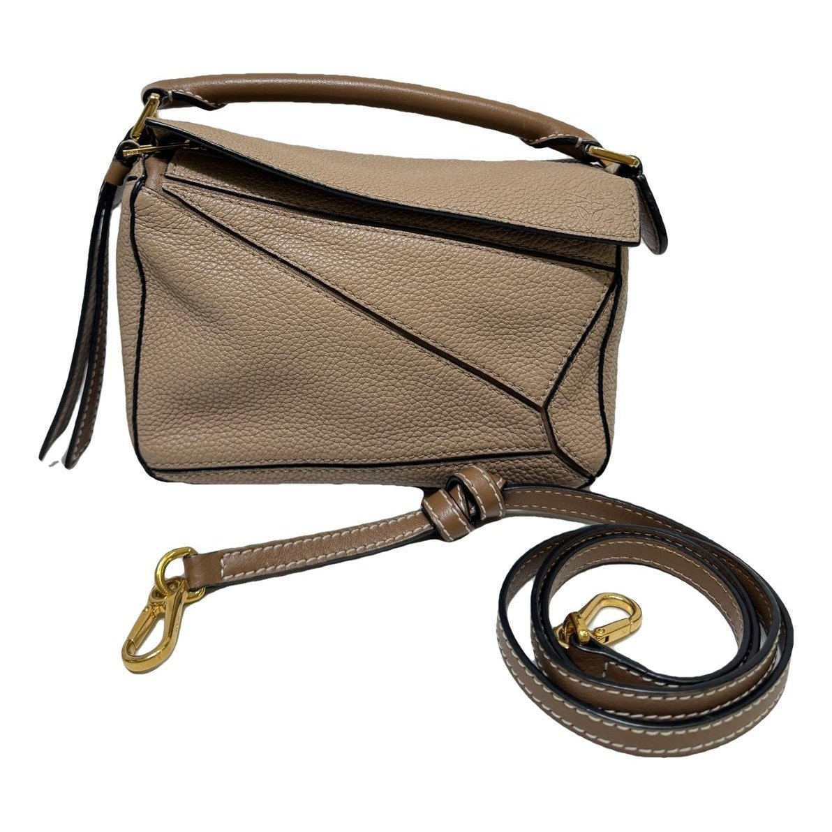 Puzzle leather handbag