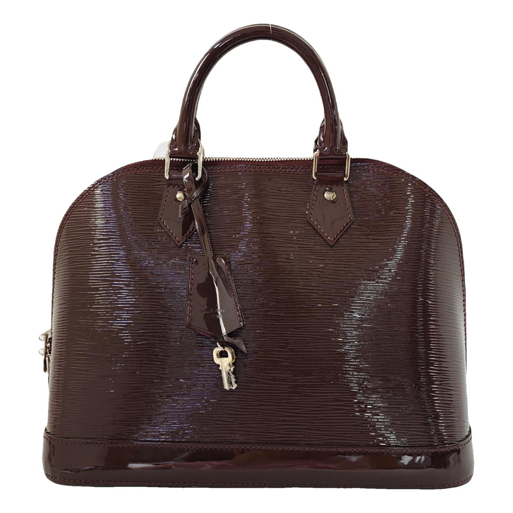 Alma BB patent leather handbag