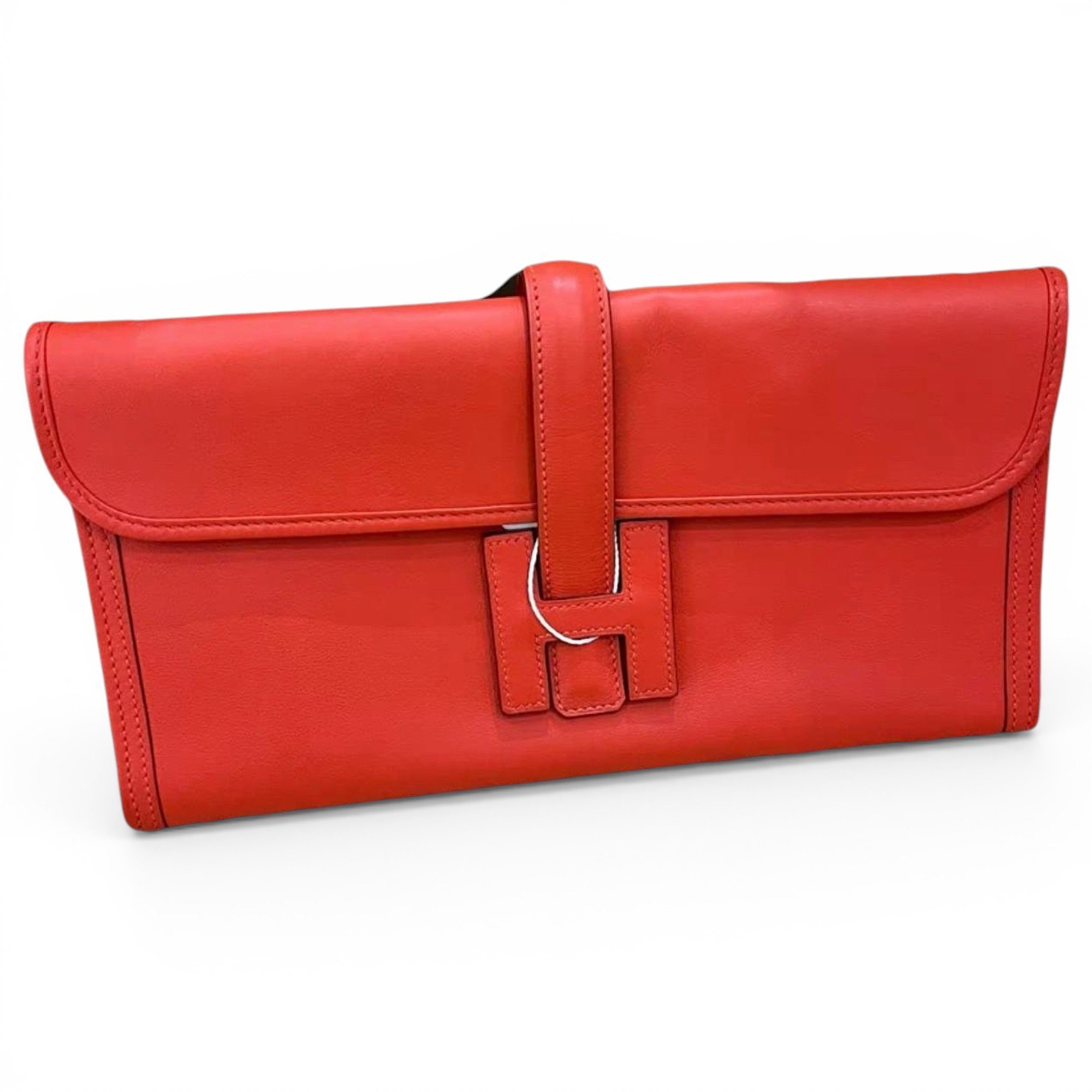 Jige leather clutch bag