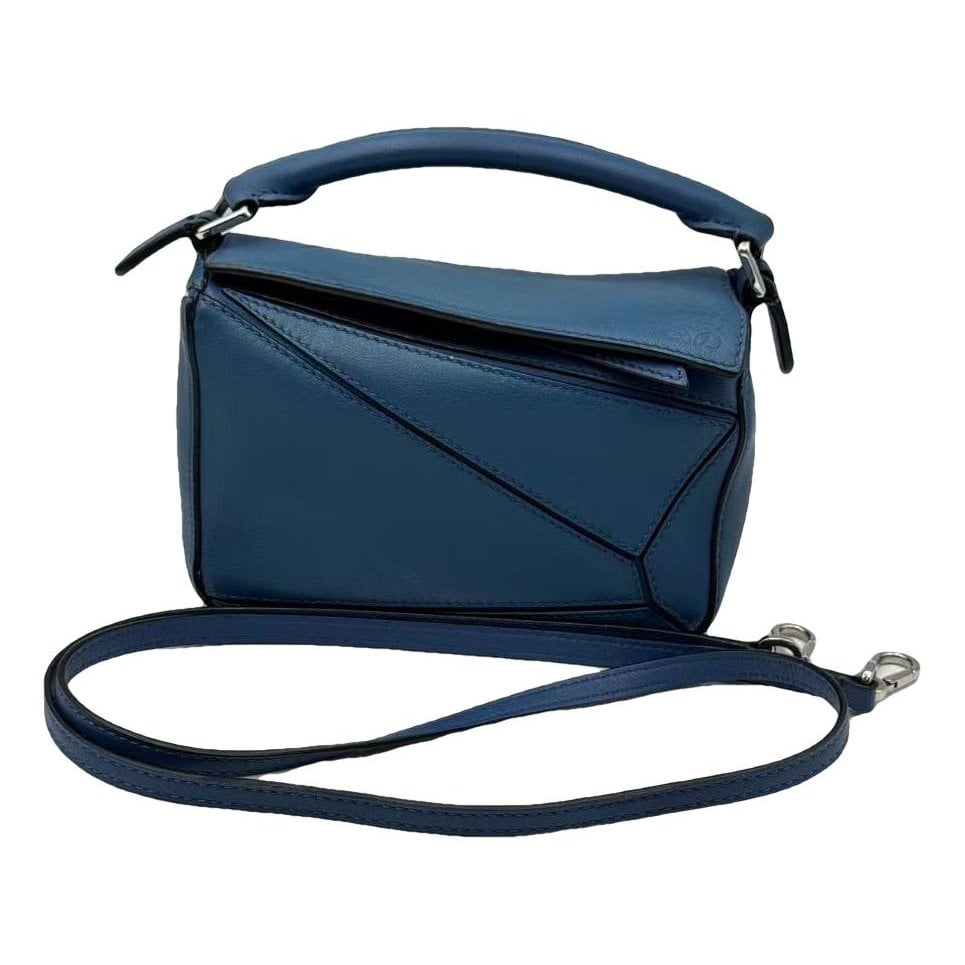 Puzzle leather handbag