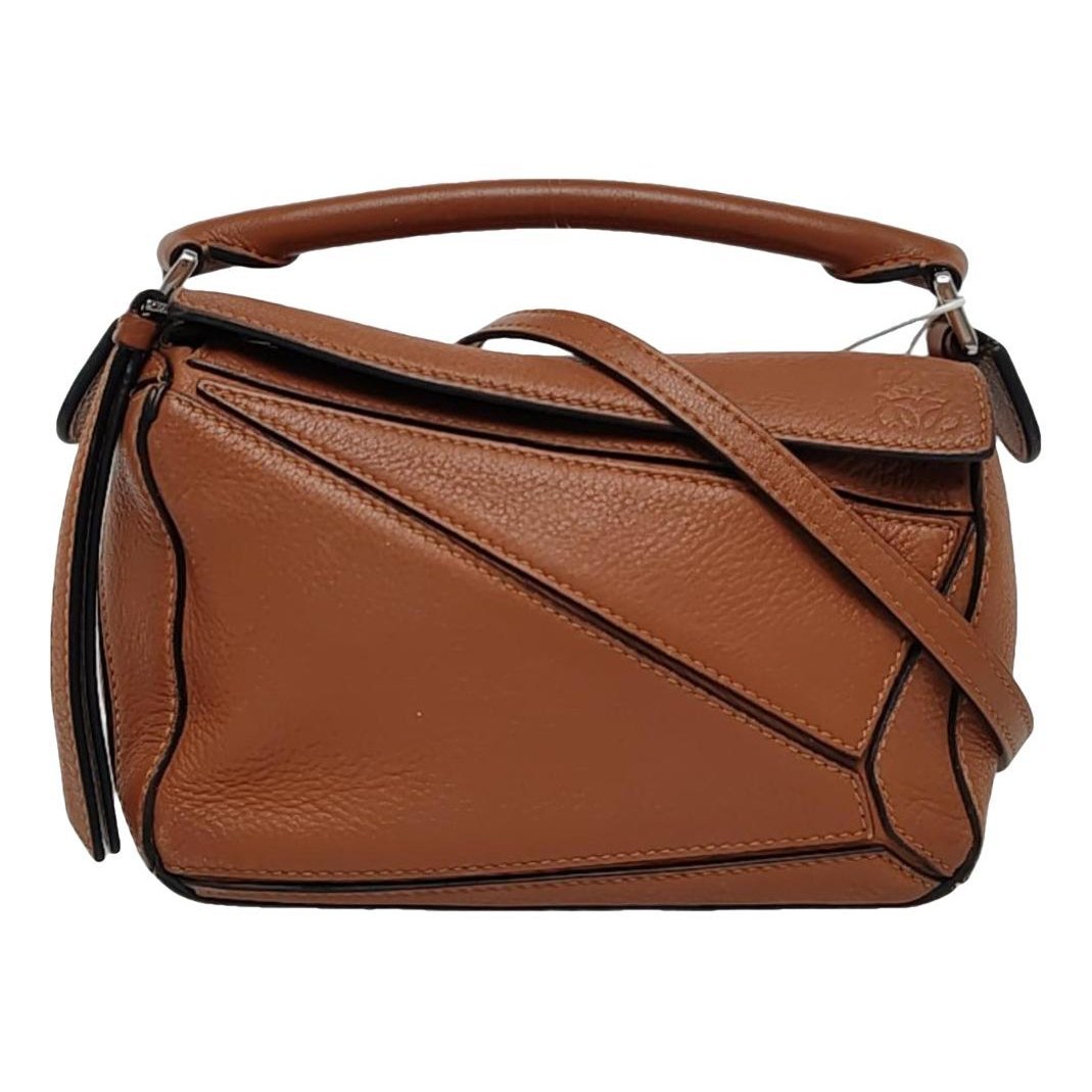 Puzzle leather handbag