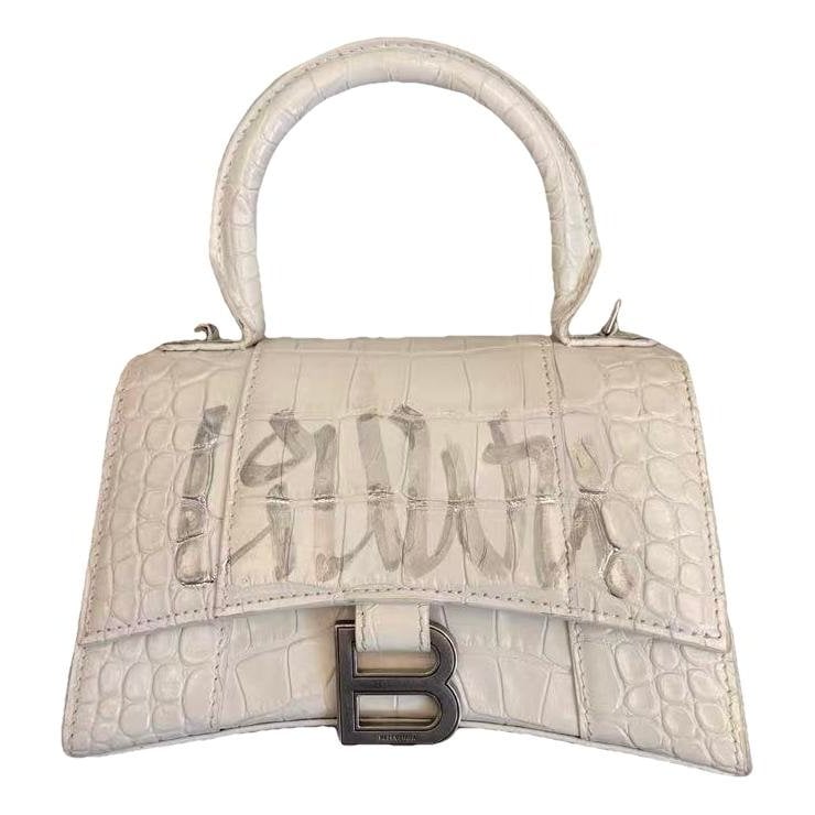 Hourglass leather handbag