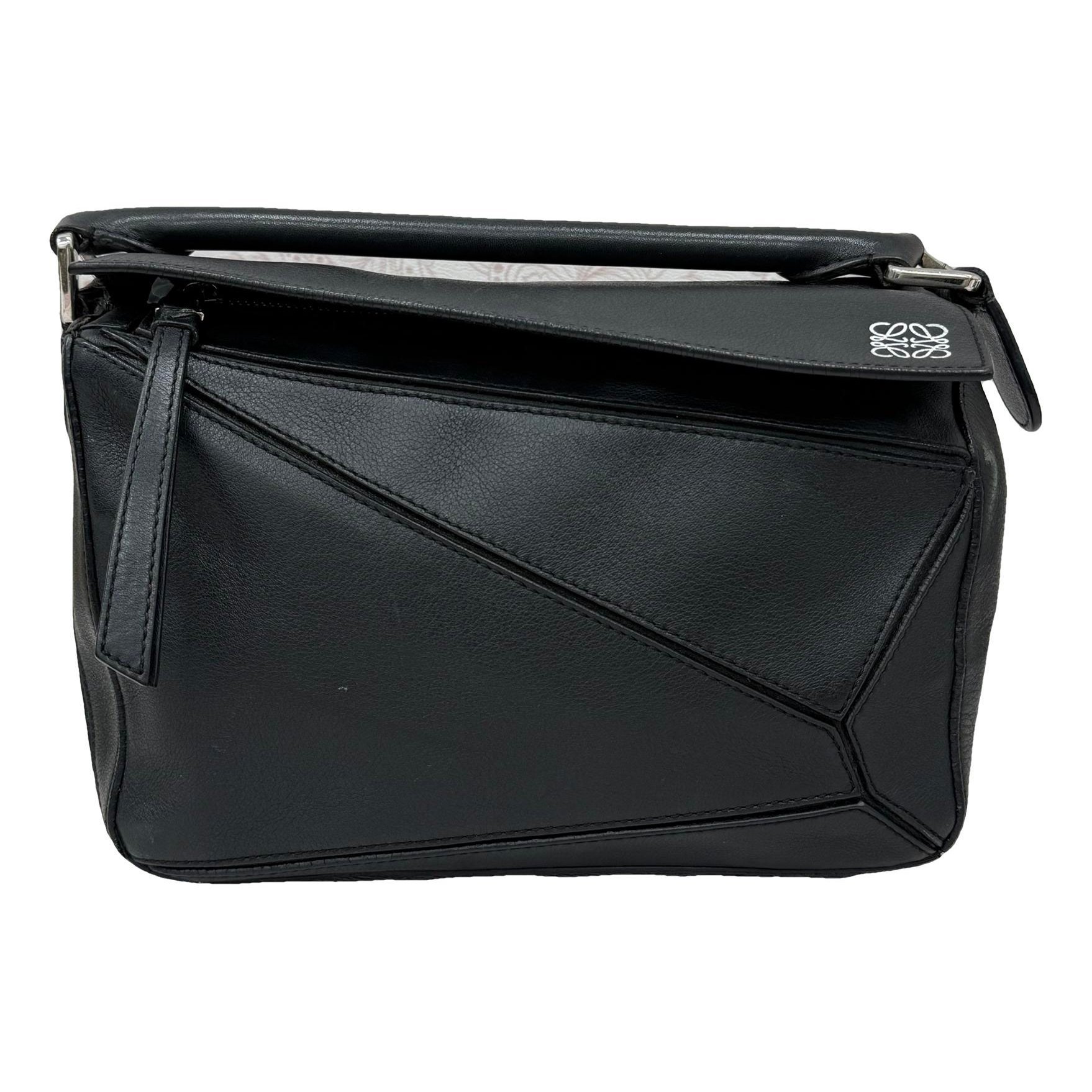 Puzzle leather handbag