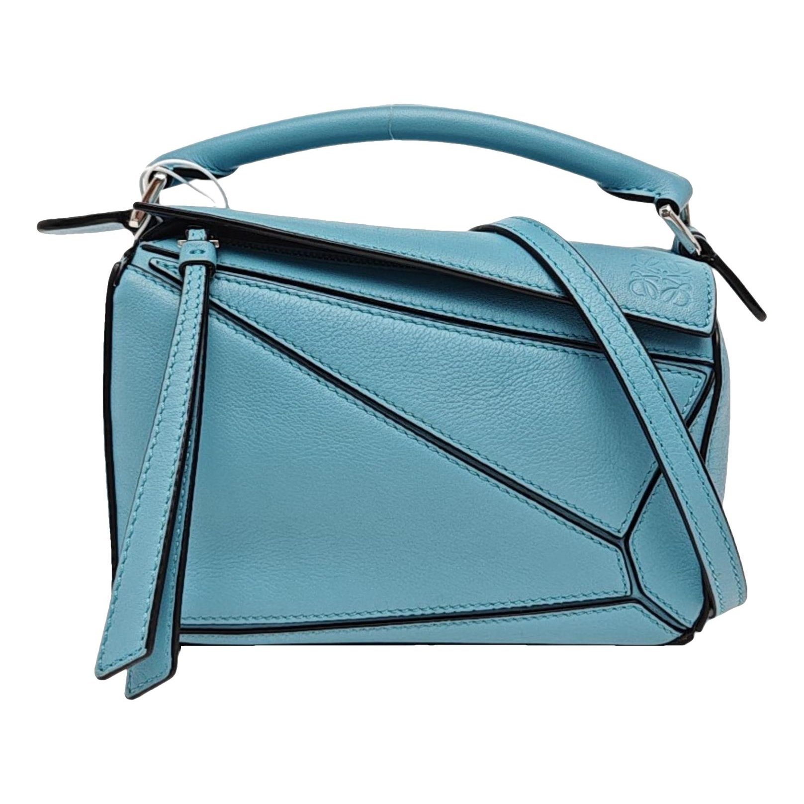 Puzzle leather handbag