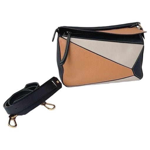 Puzzle leather handbag