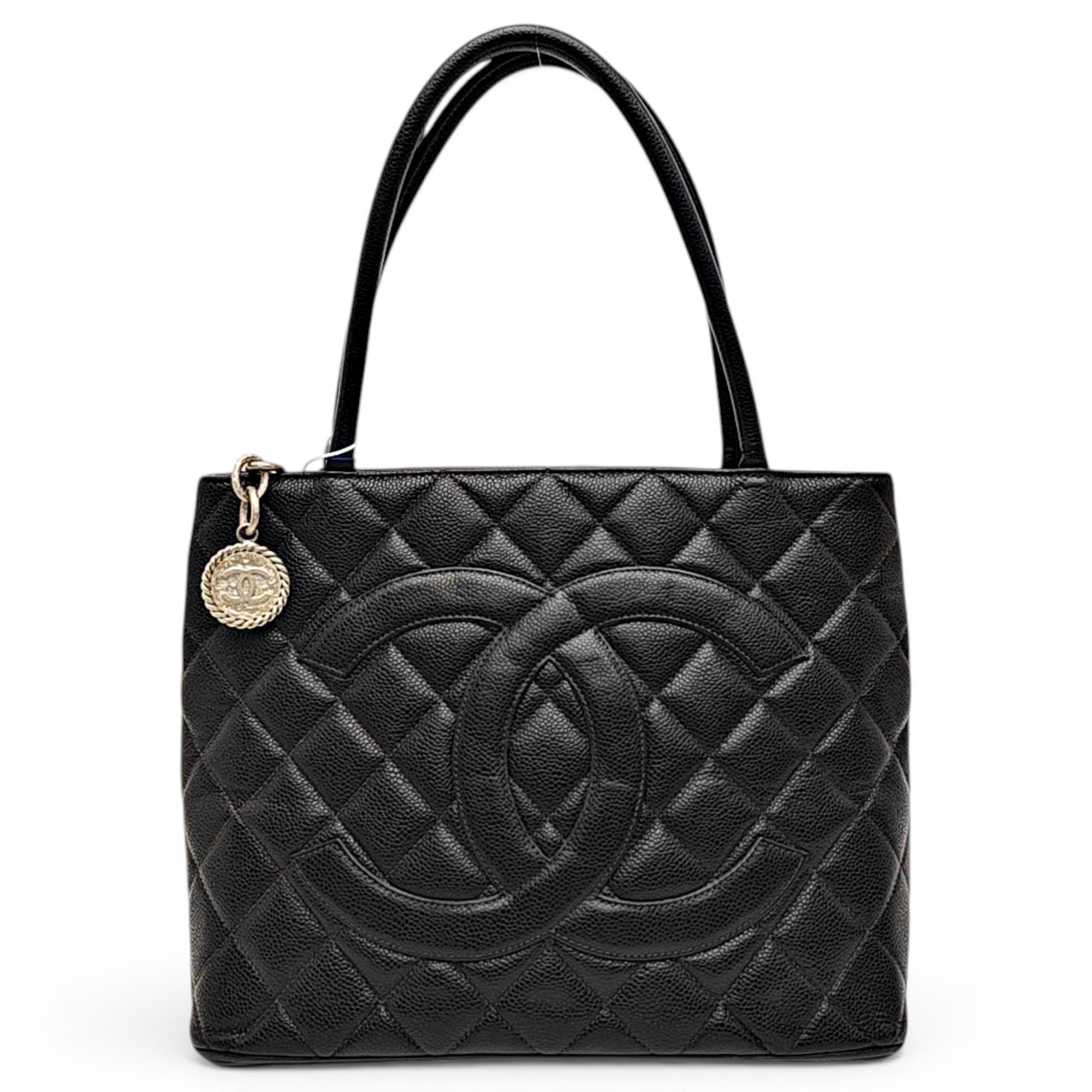 Médaillon leather handbag