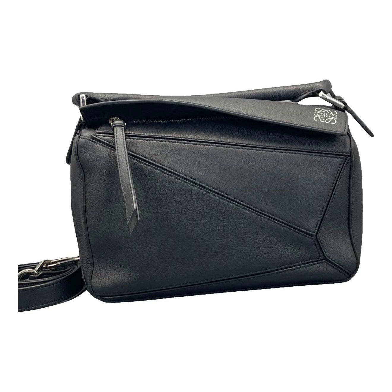Puzzle leather handbag