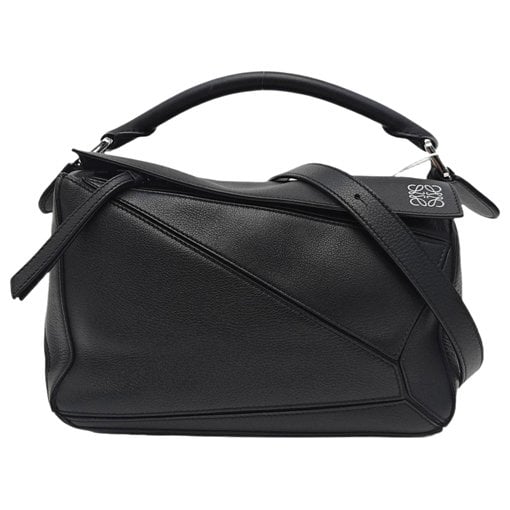 Puzzle leather handbag