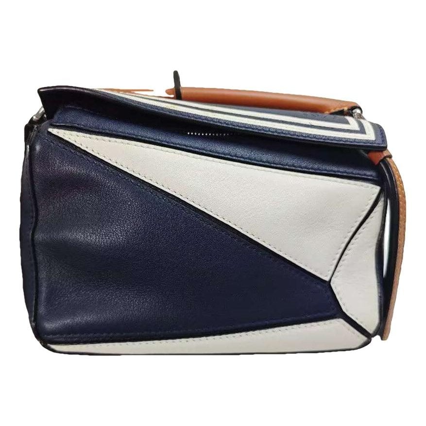 Puzzle leather handbag