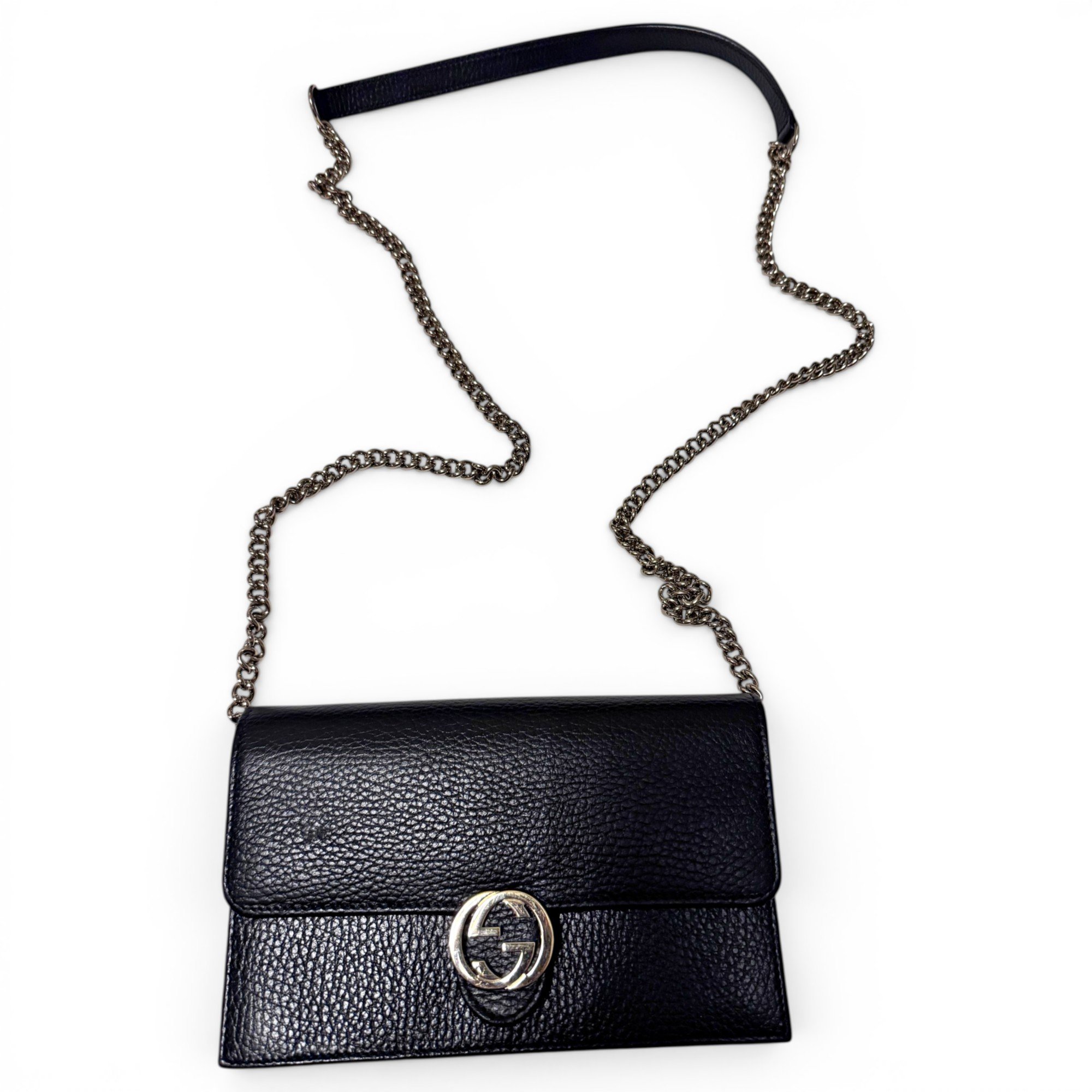 Interlocking leather clutch bag