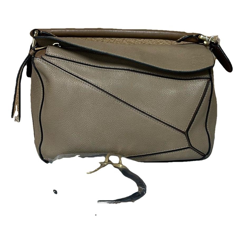 Puzzle leather handbag
