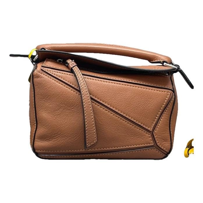 Puzzle leather handbag